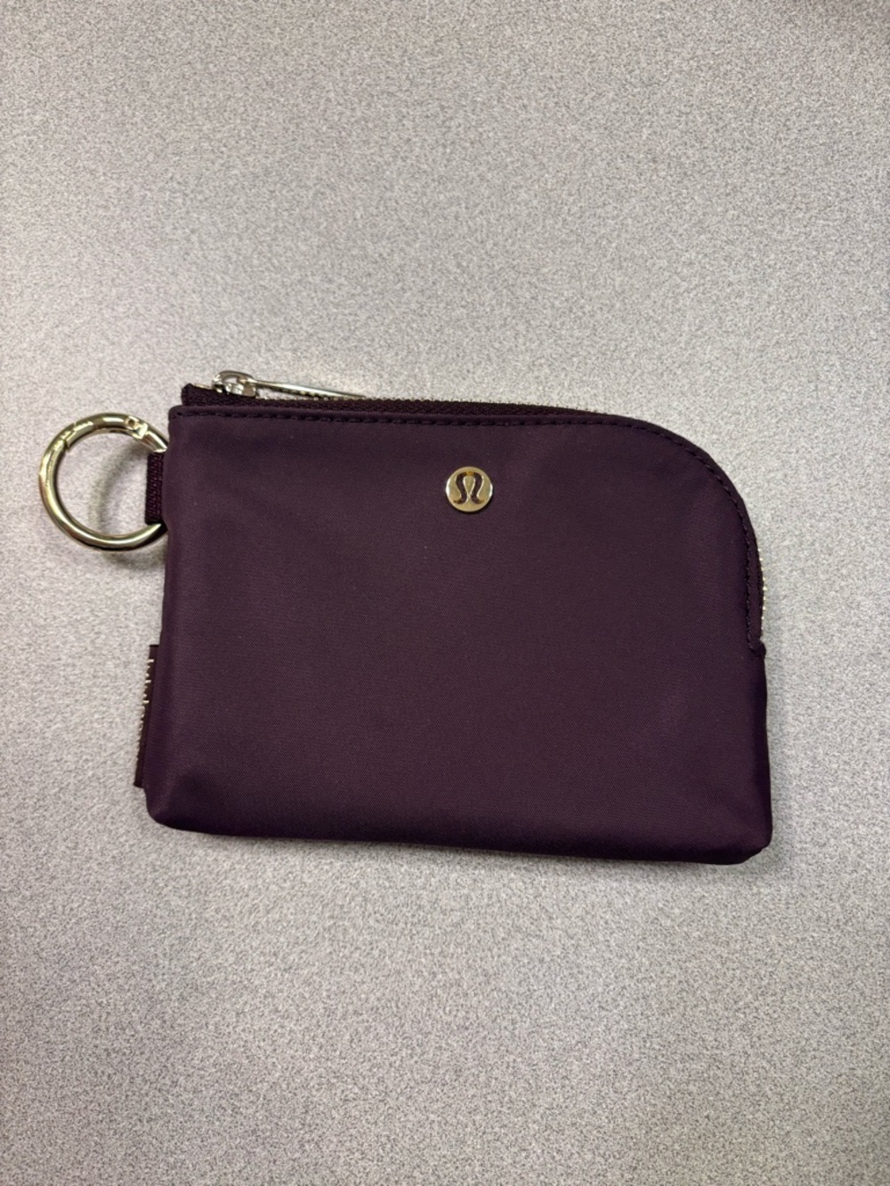 lululemon athletica Small Zip Pouch in Deep Plum with Gold Hardware